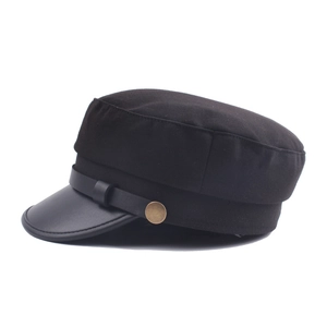 Classic black military flat top hat with leather brim and vintage metal button detail