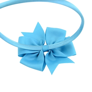 Light blue grosgrain ribbon bow headband for children featuring a large fish tail design