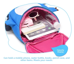 Detailed interior view showing large capacity for books and tablets in cartoon backpack