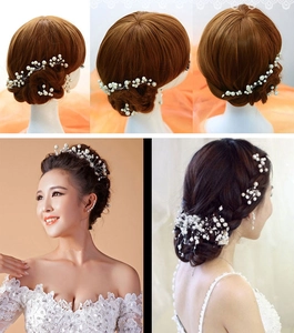 Detailed view of handmade pearl bridal hair pins and flexible silver wire hair accessories
