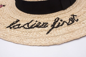 Summer raffia straw sun hat for women with Ladies First embroidery and black ribbon