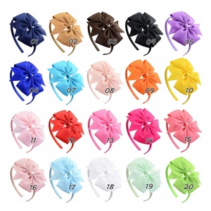 Detailed view of 20 color options for kids ribbed grosgrain ribbon bow headbands