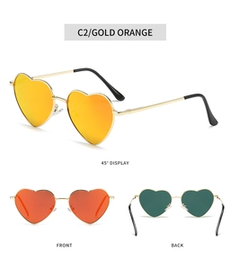 Three angles of gold heart-shaped metal sunglasses with orange mirrored lenses