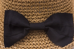 Handmade raffia straw sun hat with black grosgrain bow for summer beach vacation