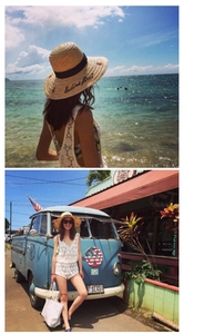 Detail of straw sun hat with black ribbon and Ladies First embroidery for beach vacations