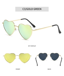 Detailed views of gold heart-shaped metal sunglasses with green reflective lenses