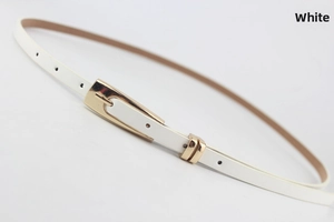 Close-up of white slim leather belt with a rectangular gold buckle for women fashion
