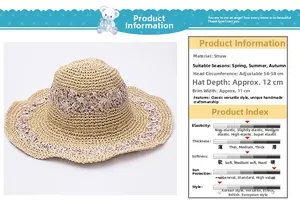 Detail view of woven paper straw sun hat with measurements and floral decoration