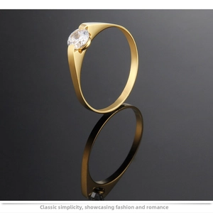Detailed view of a rose gold titanium ring with a brilliant round solitaire diamond