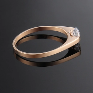 Polished rose gold titanium steel ring with a round tension-set sparkling crystal stone