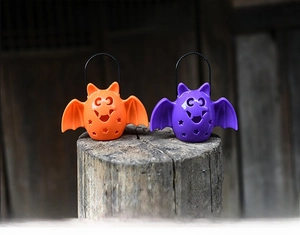 Halloween bat bucket with gradient lights and spooky sounds in orange and purple