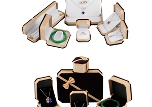 Detail of octagonal velvet jewelry boxes with elegant bow ties and satin lining