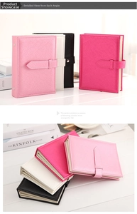 Portable earring storage book featuring four elegant colors and a secure buckle closure