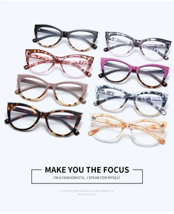 Detailed flat lay of cat eye eyewear frames in 8 assorted colors and marble patterns