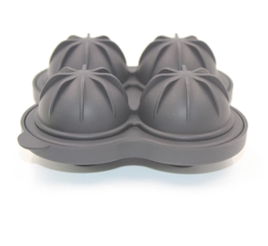 Detail view of a 4-hole gray silicone ice ball mold top with water injection holes