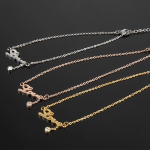 Three-color Love letter necklaces in silver, rose gold, and gold with round crystal drops