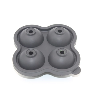 Detail of grey 4-cavity silicone ice ball mold for professional sphere ice making