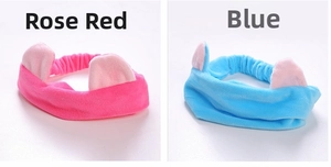Detail of rose red and blue plush cat ear headbands made of soft coral fleece material