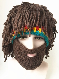 Detailed shot of handmade knit Rasta hat with brown yarn beard and wig attachments