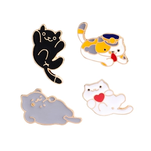 Set of four cute cartoon cat enamel pins in black, grey, calico, and white with heart