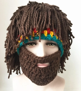 Close-up of Rasta knit hat with brown beard and wig featuring red yellow blue stripes