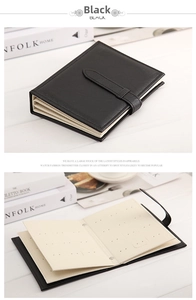 Black leather jewelry storage book with buckle for organizing earrings and studs