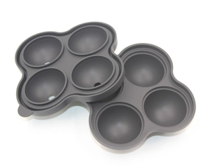 Detailed view of grey silicone ice cube tray set with a 4-hole spherical mold design