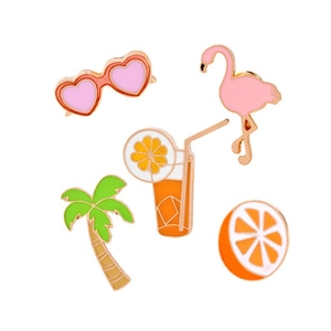 Detail showing a 5-piece summer enamel pin set with flamingo and palm tree designs