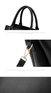 Detail of lychee pattern leather handbag with golden hardware and reinforced stitching