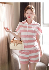 Close-up of pink and white striped loungewear set with hooded top and matching shorts