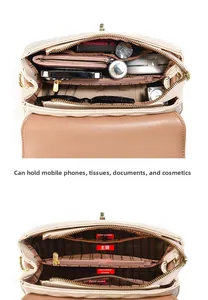 Detailed view of women's crossbody bag with five organized interior storage compartments