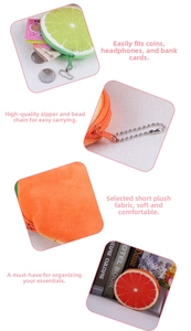 Close-up of plush fruit coin purses featuring soft fabric, metal zippers and beaded chains