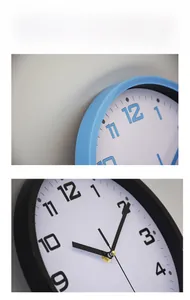 Detail of 10-inch minimalist round wall clocks in sky blue and black frame finishes