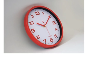 Detail view of the 10-inch red wall clock with bold numerals and VREMI logo branding