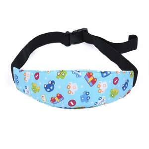 Detail of blue toddler car seat head support strap with cartoon car pattern and buckle