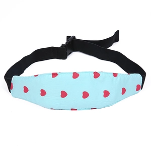 Detail view of the adjustable blue head support strap with heart pattern and safety buckle
