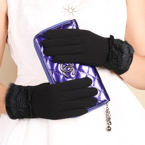 Women's black thermal gloves with plush fur trim and bow detail for winter cycling