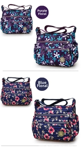 Dettaglio delle borse a tracolla in nylon impermeabile con motivi floreali e tasche con zip