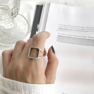 Close-up of a square hollow S925 sterling silver ring with micro-pave cubic zirconia