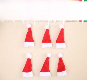 Set of six mini red non-woven Santa hats for lollipop and doll Christmas decoration