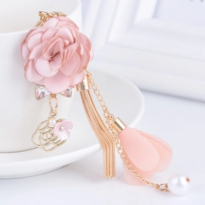 Portachiavi fiore in tessuto rosa con nappa dorata, perla e strass per borse chic