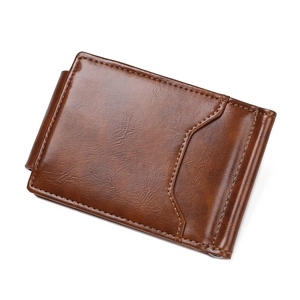Macro detail of brown vintage leather texture and stitching on men's slim money clip