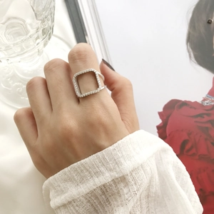 On-finger view of a S925 sterling silver square geometric ring with pavé zircons