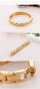 Macro shot of gold plated stainless steel men's link bracelet with pavé crystal inlay