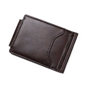 Detail view of a slim brown leather money clip wallet with an external card slot