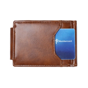 Detail view of brown vintage leather wallet with card slot and fine stitching accents