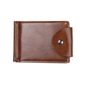 Detailed close-up of brown faux leather wallet with snap buckle and silver metal button