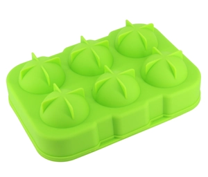 Detail of green food-grade silicone mold for making 6 round ice balls or baking treats