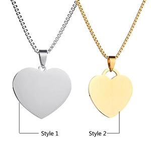 Polished heart-shaped pendant necklaces in silver and gold steel with box chain