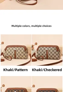 Detailed close-up of khaki letter print and plaid crossbody bag with gold hardware accents